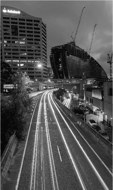 Black and white Melbourne road light trails